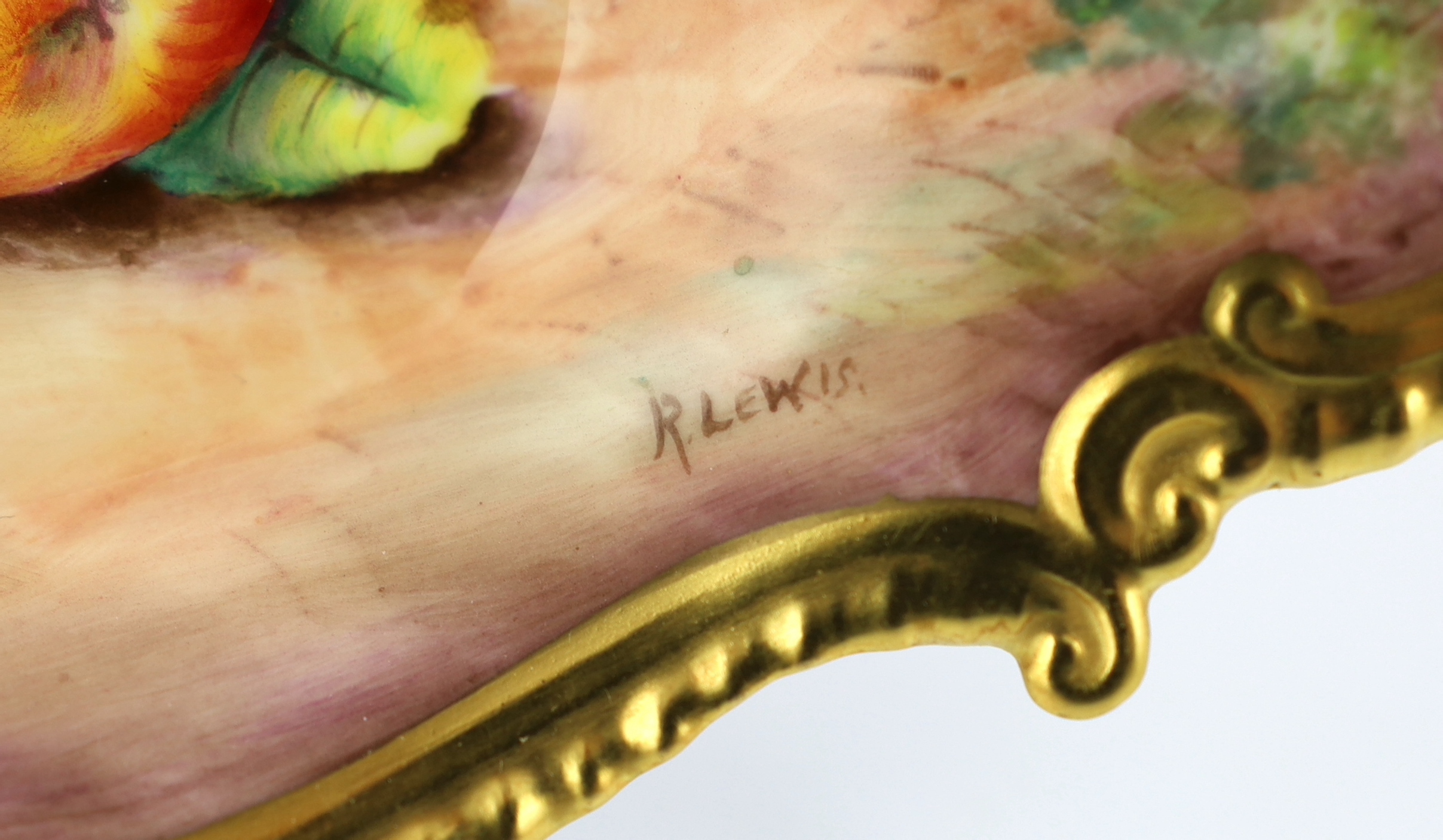 A Royal Worcester fruit painted lozenge shaped dish, by R. Lewis